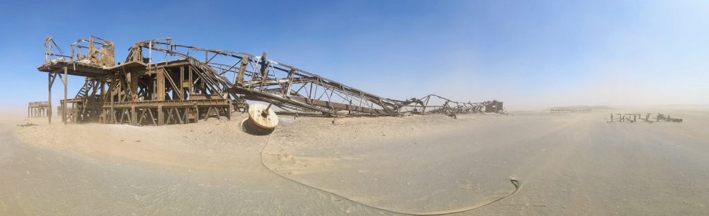 A collapsed abandoned oil rig in the desert of Namibia